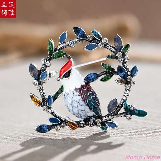 a beautiful bird made of glass, beads and beads