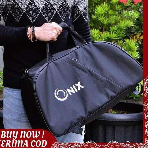 a man holding a bag with a logo on it.