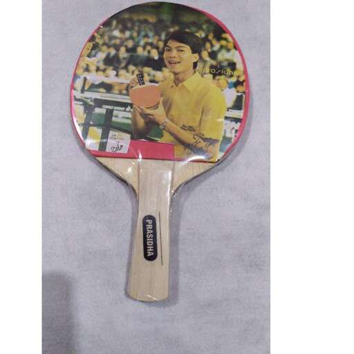a picture of a tennis player on a wooden spoon.