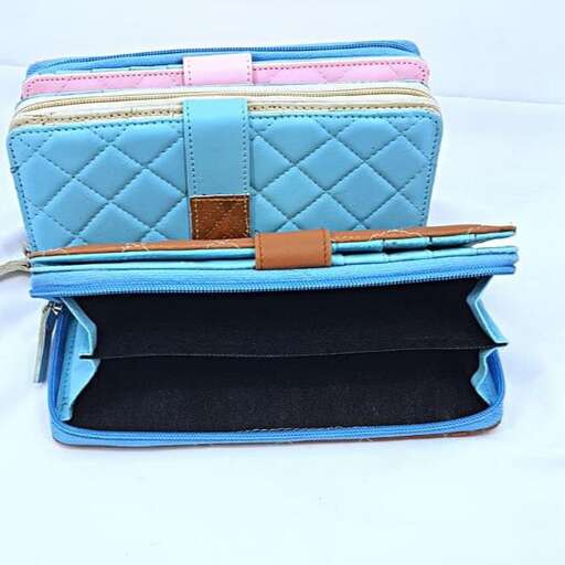 a blue and pink purse with a zipper.