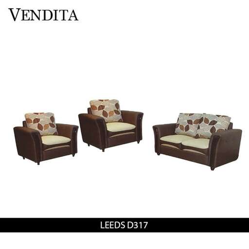 a brown and white couch with a brown chair and a brown and white pillow.