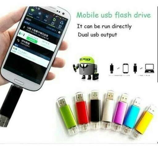 a person holding a cell phone with a battery attached to it.