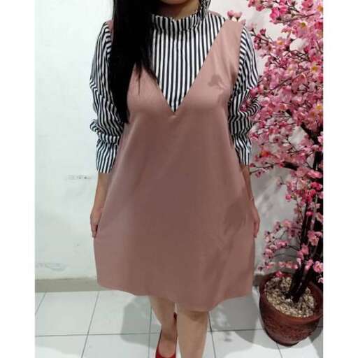 person in a striped dress