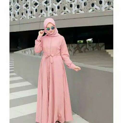 a woman in a pink dress