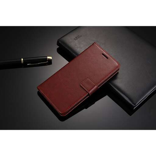 the wallet is a small leather wallet that is made of leather.