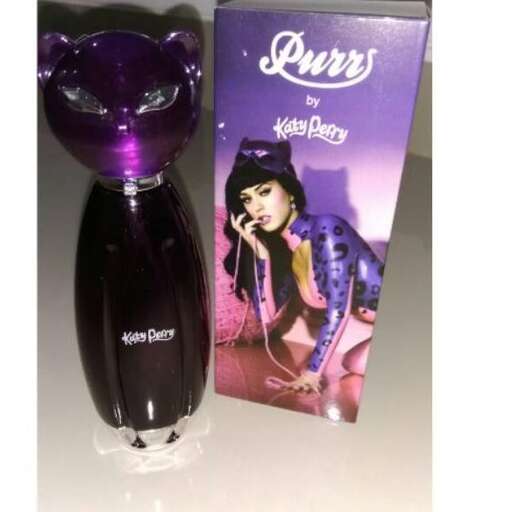 a purple perfume bottle with a purple bow.