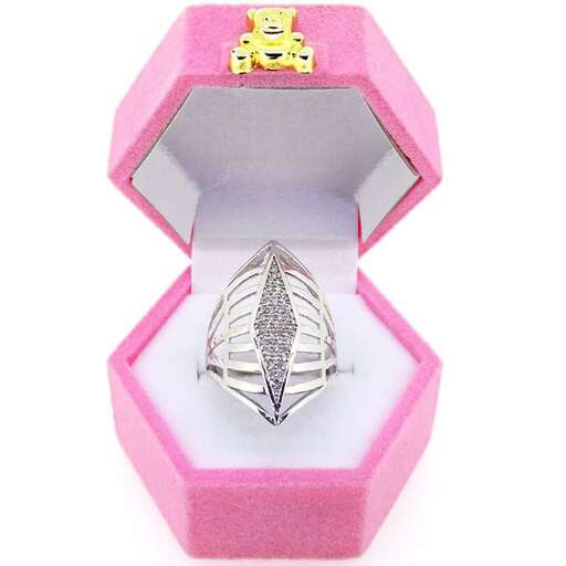 a diamond ring in a pink box