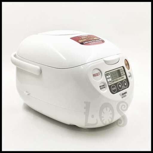 a white electric toaster is shown on a white background.