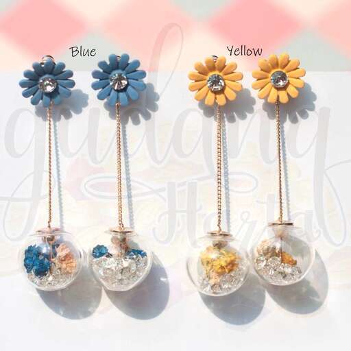blue flowers in a glass vase