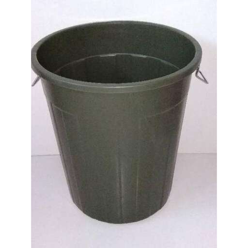 a green trash can is sitting on a white surface.