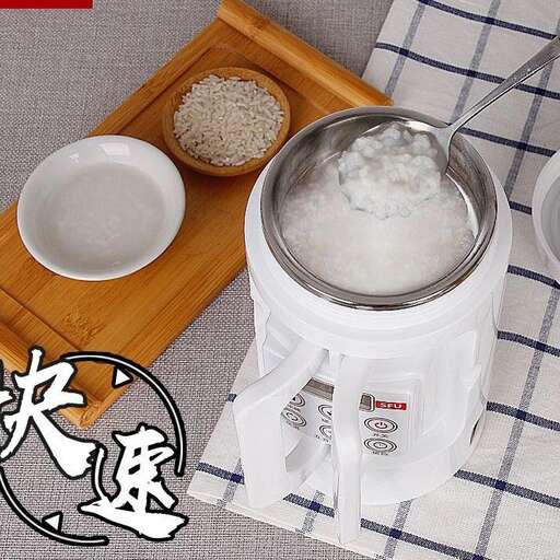 a white food processor with a bowl of rice in it.