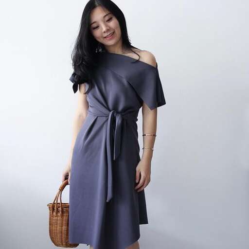 a wrap dress with a handbag