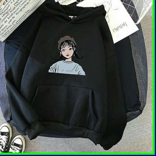 a girl in a hoodie with a picture of a person on it.