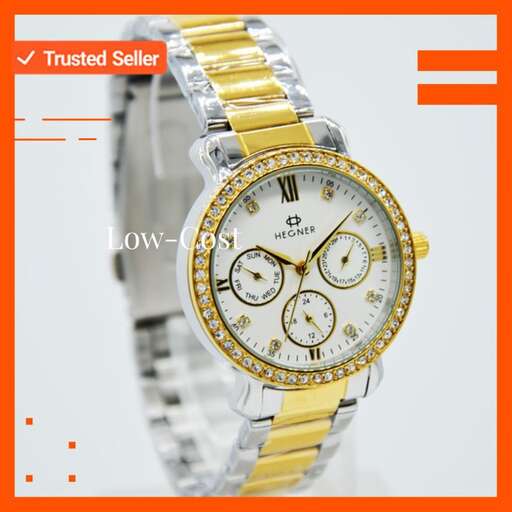 a watch that is yellow and white with diamonds.
