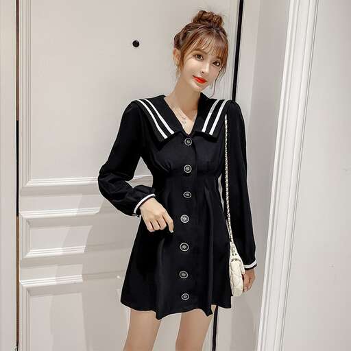 black dress with white trim and black buttons.
