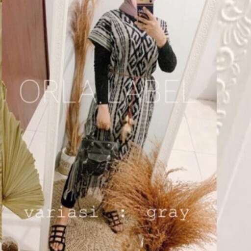 a girl in a black and white dress