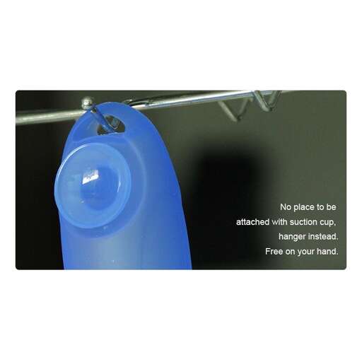 a blue glass bottle opener hanging on a clothesline rack.