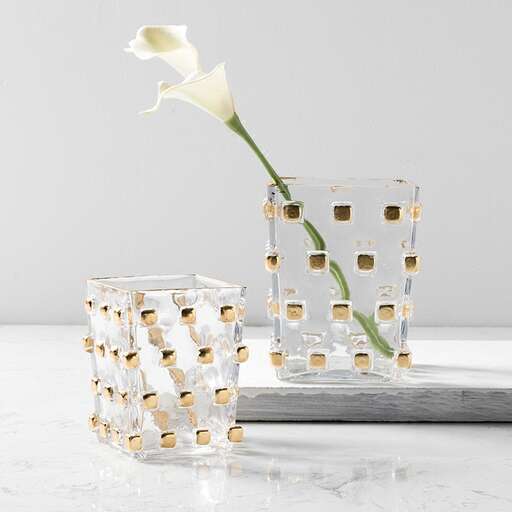 a white flower in a cube