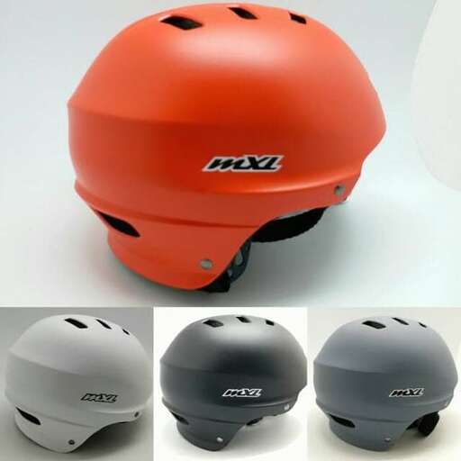 a helmet that is on a white surface.