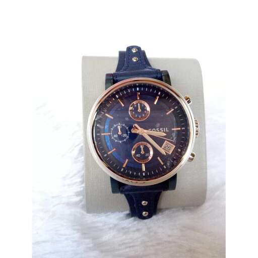 a watch with a blue face and a black dial.