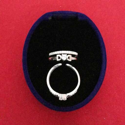 silver ring with a pair of earrings