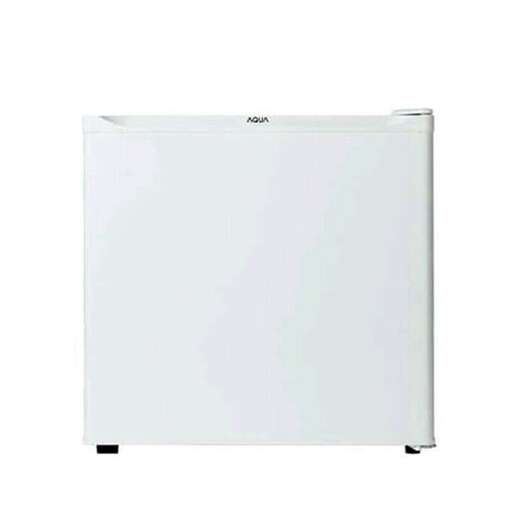 a white refrigerator freezer with a black base.