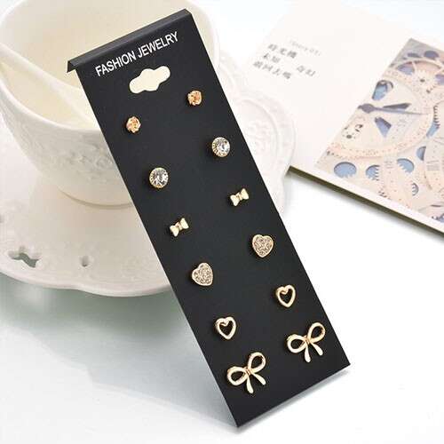 a black tie with gold hearts on it.