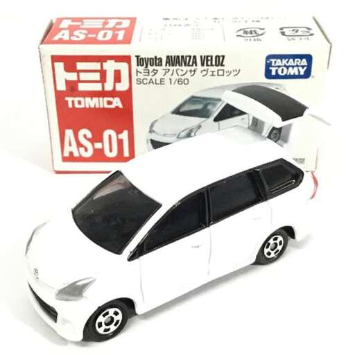 a white car with a red background and a white box.