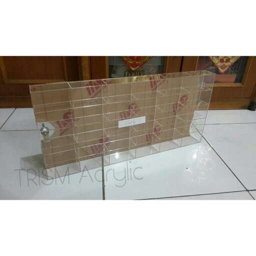 a glass box with a floral design