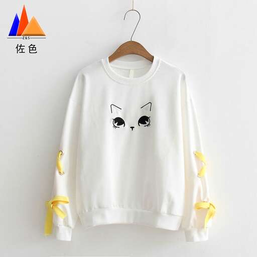 white long sleeved t - shirt with a cat face on the front
