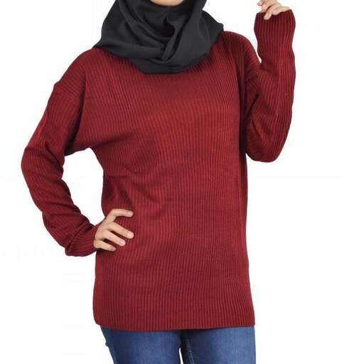 a woman wearing a scarf and scarf