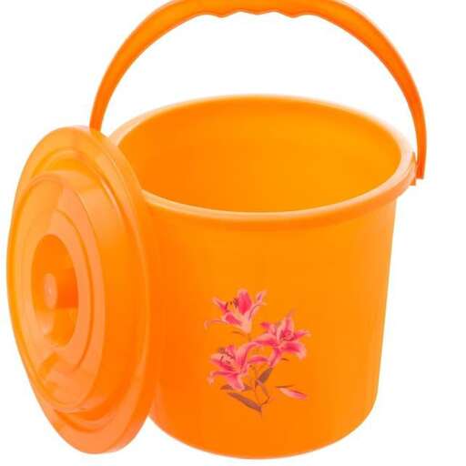 orange watering can with a flower design