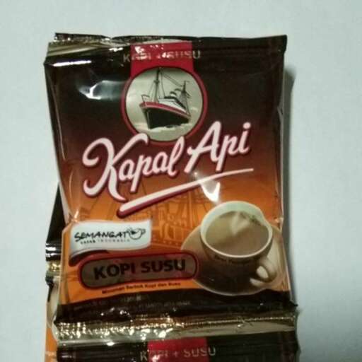 a bag of coffee sitting on top of a table.