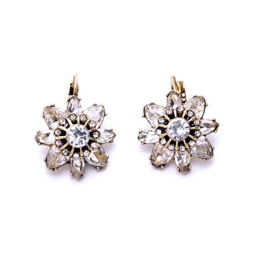 a pair of earrings with diamonds
