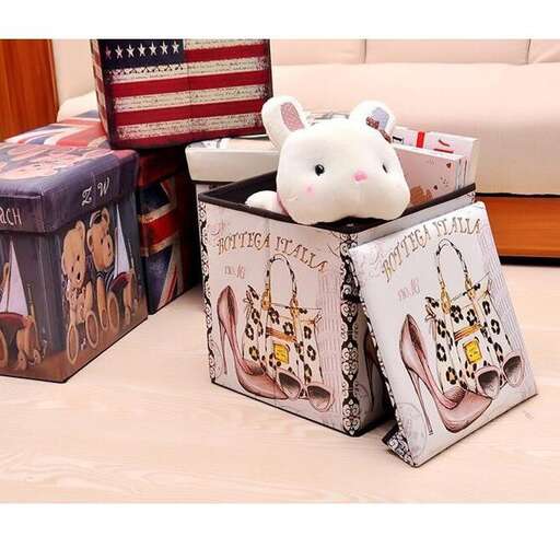 a white couch with a stuffed animal on it