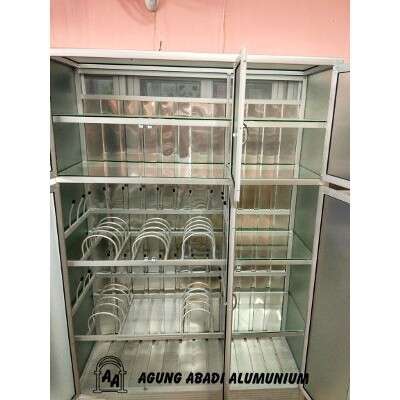 a refrigerator with a metal shelf and shelves.