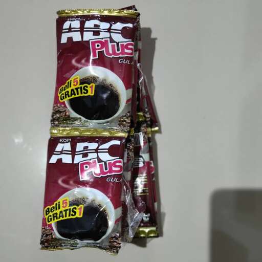 a bag of gums in a glass case.