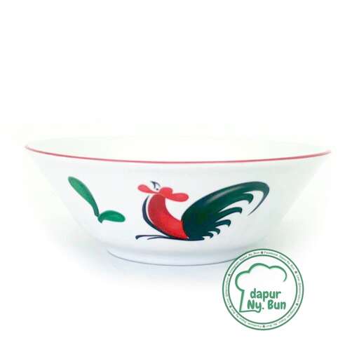 a bowl of fruit on a white background