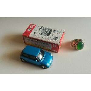 a small car and a small toy car.