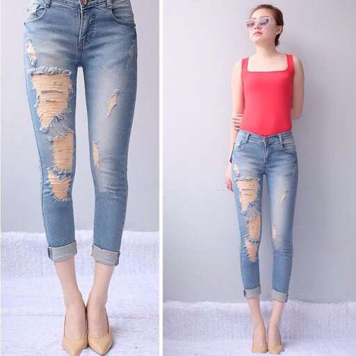 i love the ripped jeans with the red top.