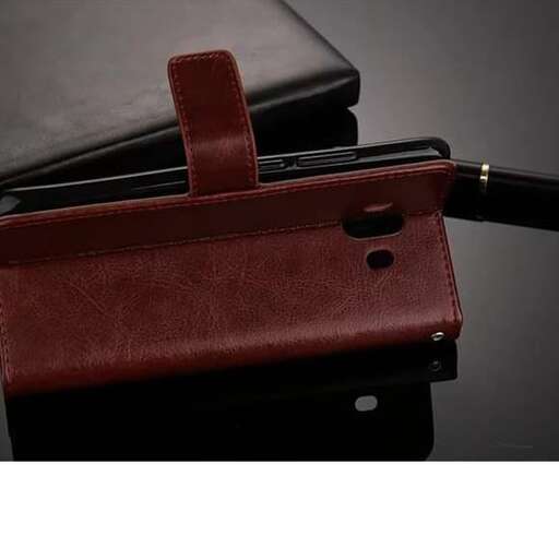 the leather shoulder bag is made of leather and is made from leather.