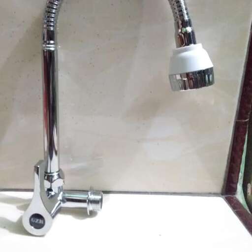 a shower head with a light on it.