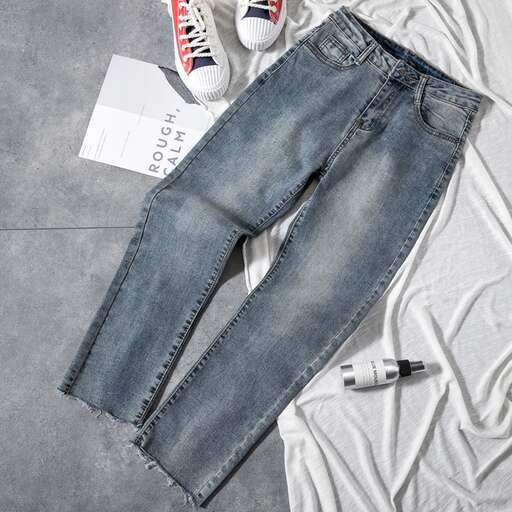 a pair of jeans with a pencil and a pen.