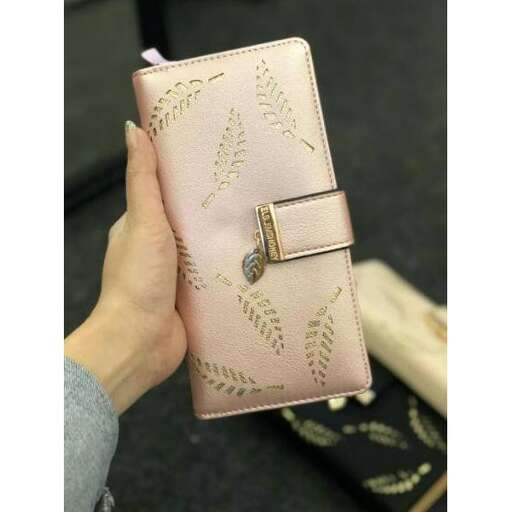 wallet with a button on the front and a zipper.