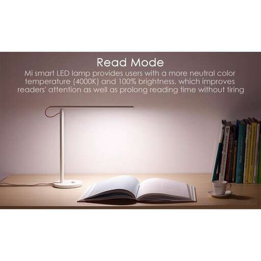 a desk lamp with a lamp on top of it.