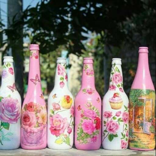 painted bottles of pink and green painted bottles.