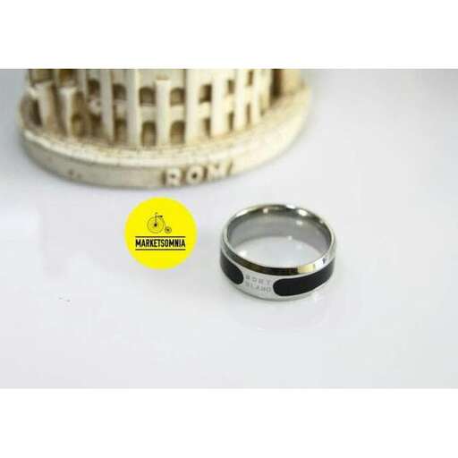 a ring with a yellow sticker.