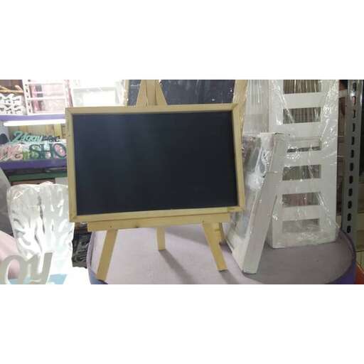 a blackboard with a wooden frame.
