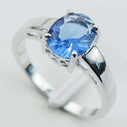 a sapphire and diamond ring in white gold