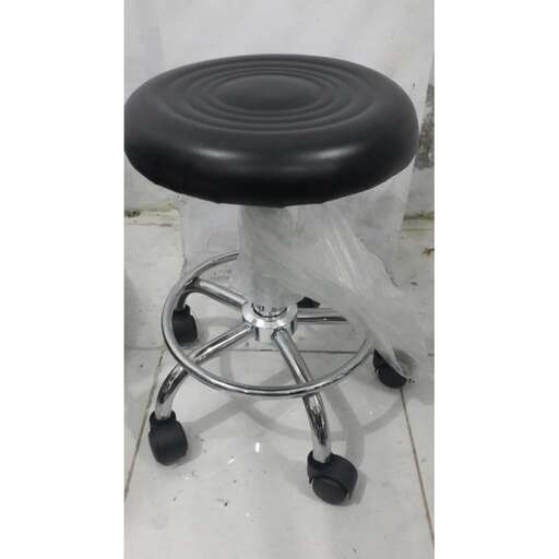 stool with a round top and a stool